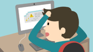 Tim SEO sedang memeriksa broken link pada website melalui laptop.
